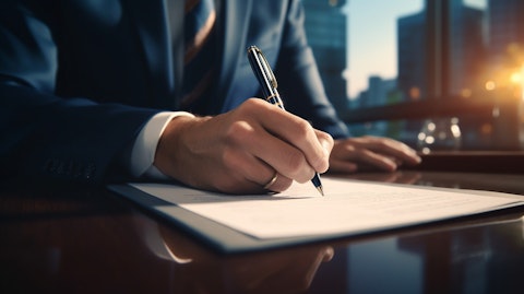 A portrait of a confident, affluent businessperson signing a money market savings account agreement.