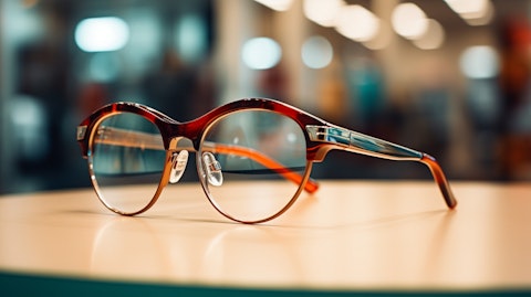 A close-up of eyeglasses on display at a Vista Optical shop.