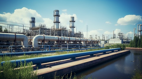 A pumping station with its industrial infrastructure in the background.