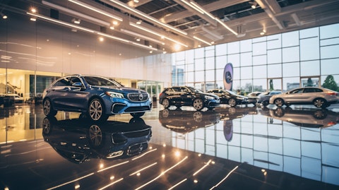 A luxury car dealership's showroom, representing the automotive industry the company operates in.