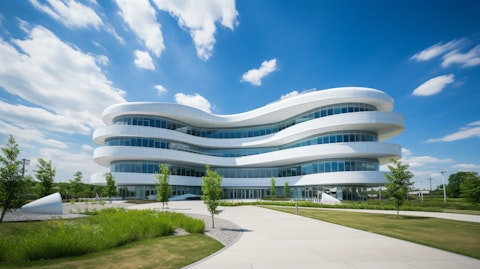 An exterior shot of the headquarters of the biopharmaceutical company under blue skies.