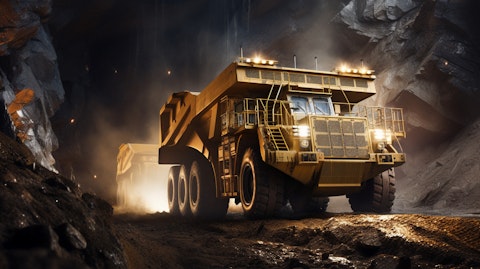 A mining truck loaded with precious metals in an open pit mine.