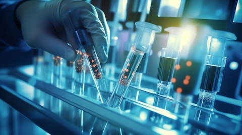 A biomedical researcher injecting antibodies into a strain of transgenic animals in a laboratory.