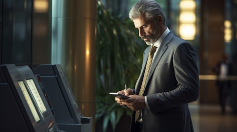 A man at a local bank branch checking the balance of his NOW account.