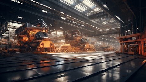 A factory floor of a heavy industry with a view of industrial manufacturing being done.
