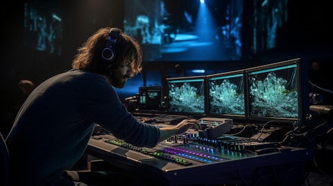 An artist at a sound stage surrounded by the latest equipment, creating content for the major cable network programming.