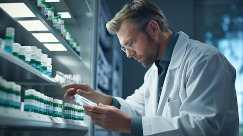 A pharmaceutical chemist examining a switch-control kinase inhibitor.