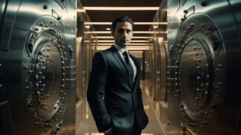 A security officer in front of a bank vault, representing the companies secure transportation services.