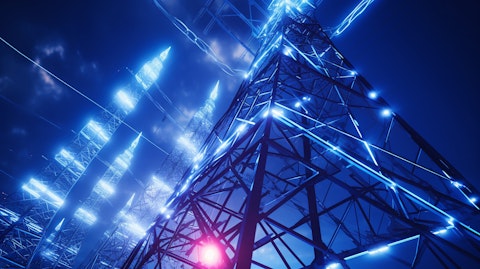 A closeup of a telecom tower with power lines connecting to it, representing the strength and reliability of network services.