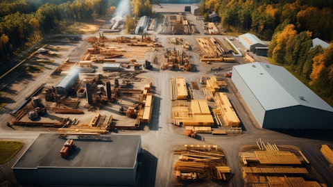 Aerial view of a wood manufacturing plant, highlighting the different divisions of the company.