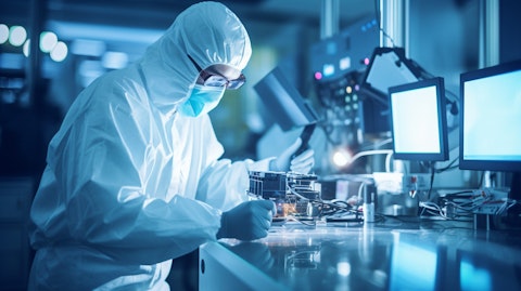 A technician in a laboratory carrying out research and development of microwave electronics.