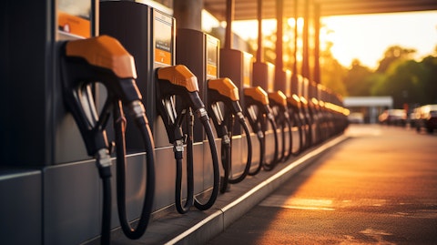 A row of fuel pumps at a fueling station, displaying the magnitude of the energy revolution.