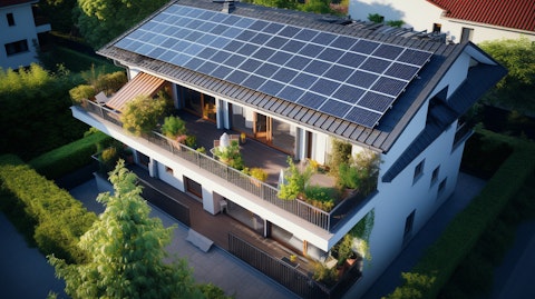 A top view of a residential building, showing solar panels and energy efficient solutions.