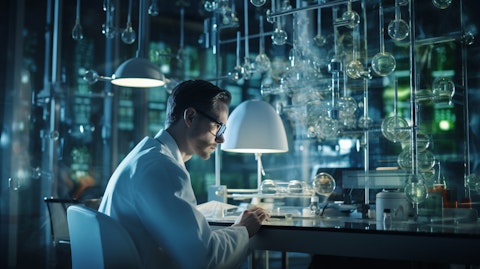 A scientist surrounded by a mass of sophisticated lab equipment researching enzymes.