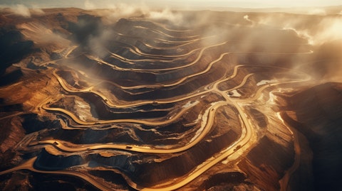 Aerial view of a gold mine, with its winding roads and pits.