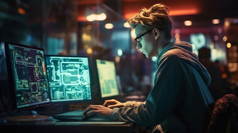 An enthusiastic programmer working on a laptop, surrounded by screens displaying code.