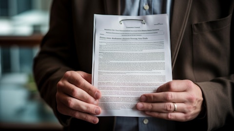 A hand holding a blank insurance policy, signifying the wide variety of coverages available.