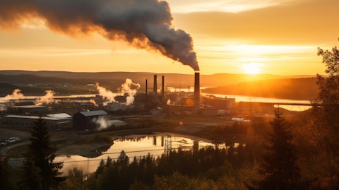 A landscape of a large paper mill at sunrise, a sign of the size and importance of the industry.