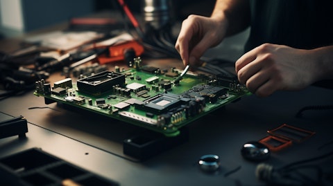 A close-up of a technician's hands assembling a hardware component of an IT solution.