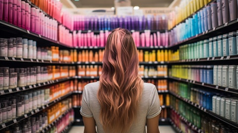 A customer in a franchised store trying out hair color products.