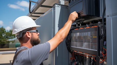 A technician adjusting a complex solar inverter system in a commercial setting.