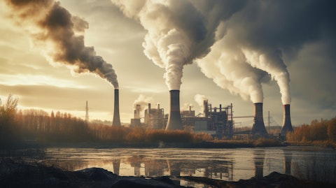 An industrial plant spewing smoke from multiple chimneys, symbolizing Enterprise Asset Performance Management.