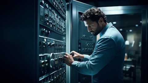 A technician demonstrating a security solution for a corporate office.