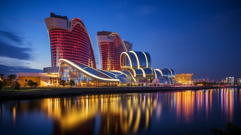 A bright and luxurious casino resort illuminated in the evening skyline.