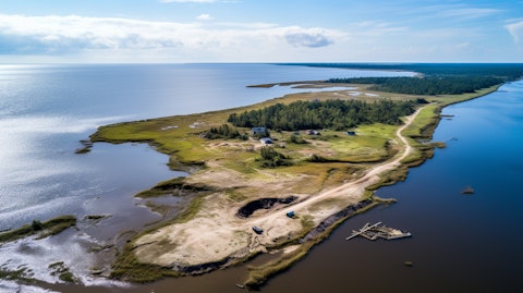 A view from an aerial drone showing the progress of an extensive coastal restoration project.