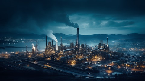 Aerial view of a steel mill, showing the large scale production of the company's steel.