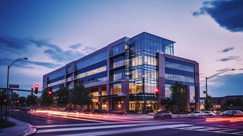 An office building lit up at dusk, representing the bank's commitment to small business development.