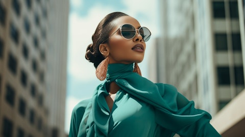 A model wearing the newest apparel and accessories from the company, showcasing their up-to-date fashion sense.