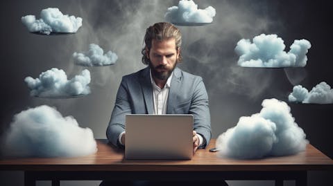 A tech savvy businessperson working on multiple devices, utilizing the company's cloud-based platform.