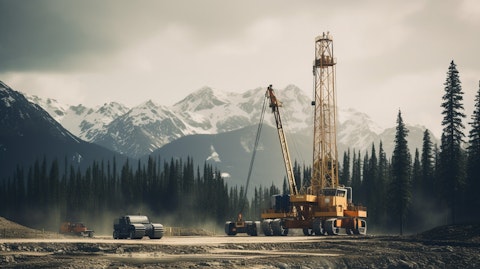 A drilling rig in action in the Western Canadian wilderness, showing the companies focus on exploration and production.