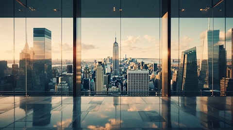A long aerial shot of an iconic building in the city, its sleek glass windows reflecting the modern skyline.