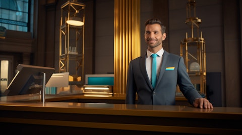 A bank manager standing next to a full-service branch counter, representing traditional banking activities.