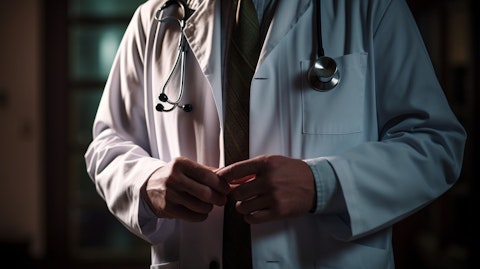 A medical healthcare professional wearing a white lab coat with a stethoscope in hand.