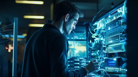 A computer engineer engaging in coding activities in a brightly lit server room.