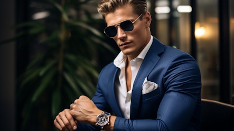 A model sporting a traditional watch, highlighting the timeless elegance of the company's watch collections.