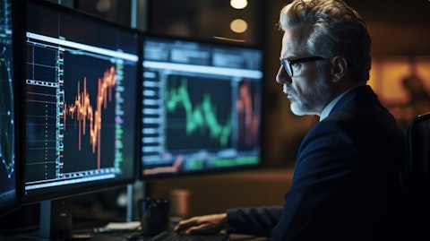 A close-up of a stock trader at their workstation, with a sharp focus on their strategy and execution.