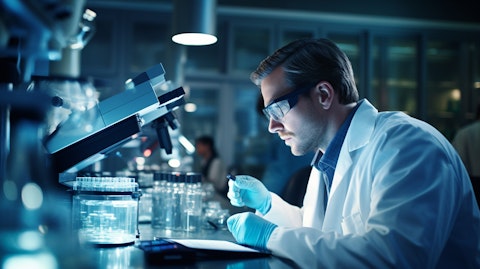 A medical professional in a laboratory analyzing the outcomes of a molecular diagnostic test.