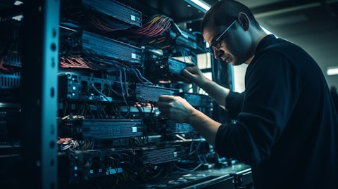 A technician installing hardware in a modern server room, highlighting the company's focus on on-premise environments.