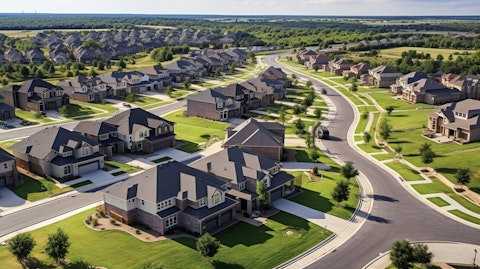 An aerial view of a large, newly constructed residential community in Arlington, Texas.
