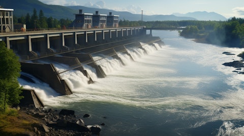 A hydroelectric plant with a large dam and water flowing through its turbines.