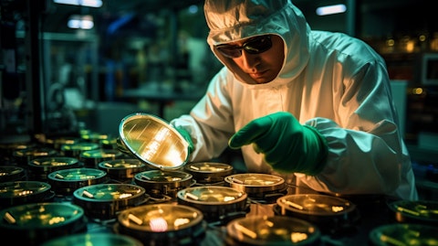 A technician inspecting a series of critical ultra-high purity components.