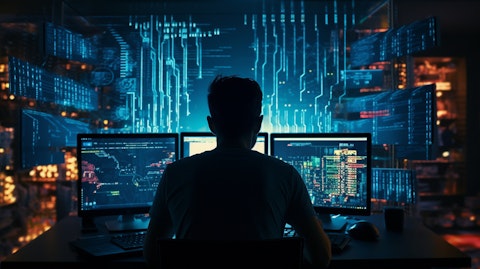 A data engineer working intently on a computer, processing complex algorithms.