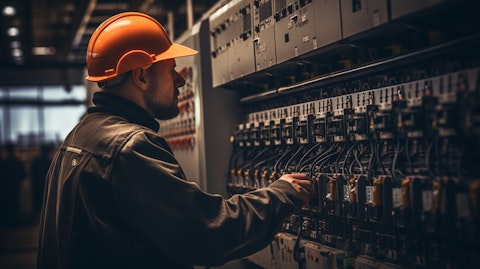 A closeup of a technician controlling a power generation facility.