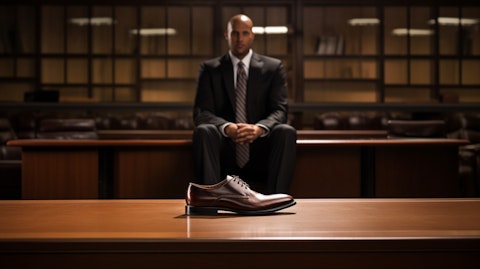 An executive in sleek dress shoes behind a corporate desk, symbolizing the corporate culture of the footwear retailer.