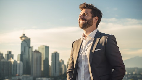 A successful businessperson looking at the city skyline with a proud smile.