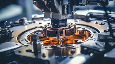 Close-up of precision equipment being used to assemble mechatronic products.